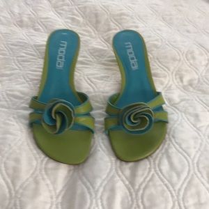 Ladies leather slides with kitten heel. Moda is a Spanish brand.